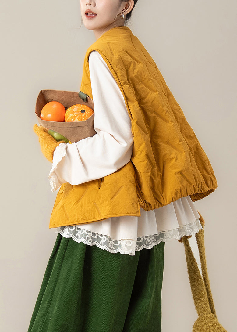 Lockere gelbe Weste mit Rundhalsausschnitt, Knopfleiste und Baumwollfüllung für den Winter