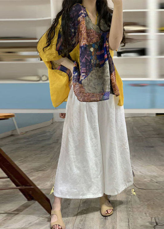 Lockeres gelbes Patchwork-Oberteil aus Leinen mit V-Ausschnitt und Hose mit weitem Bein, zweiteiliges Set mit Fledermausärmeln