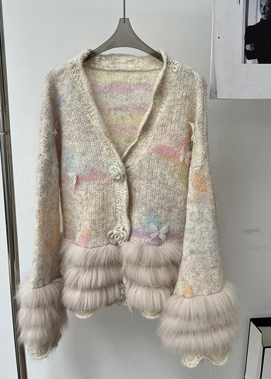 Gemütliche Strickjacke aus Baumwolle in Milchtee-Farben mit Patchwork-Design und langen Ärmeln