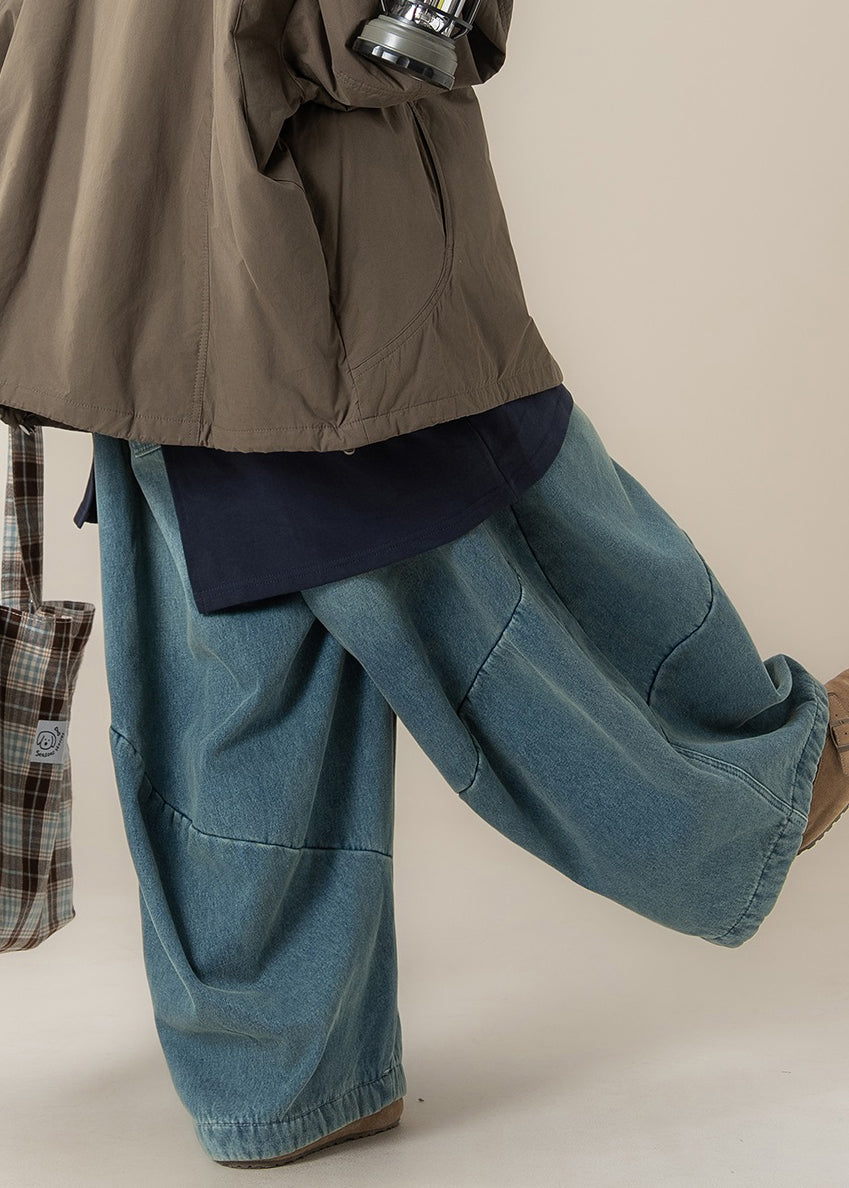 Moderne blaue Jeans mit Taschen, hohem Bund, Patchwork-Design und weitem Bein