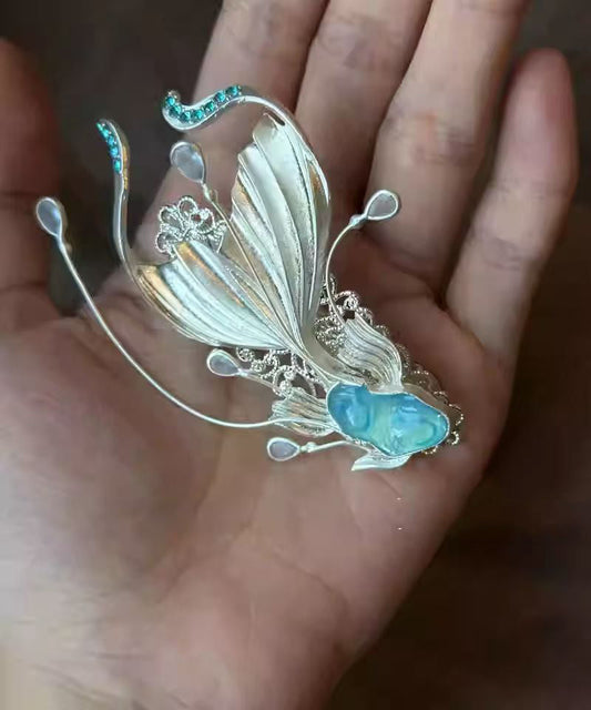 Horquilla moderna de aleación de circonitas con diseño de pez koi