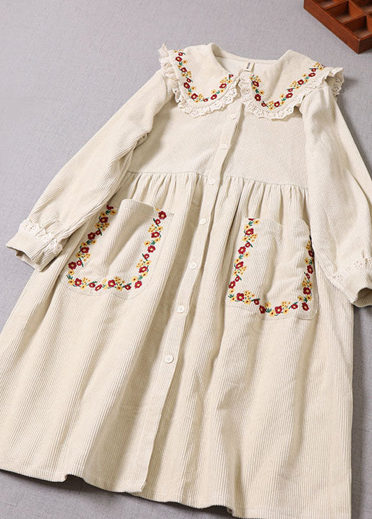 Naturbeiger Wintermantel aus Cord mit Blumenstickerei