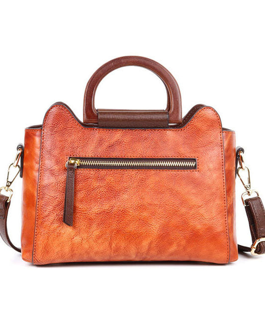 Natürliche rotbraune Handtasche aus Leder mit Blumenmuster