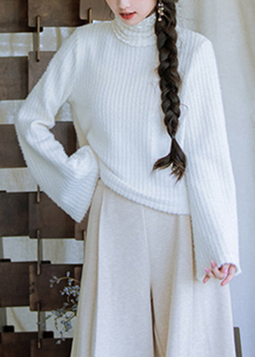 Nuevo suéter de punto blanco de cuello alto con volantes y mangas acampanadas