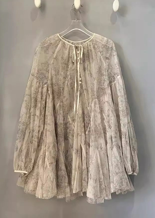 Blusa de encaje con lazo y mangas farol con estampado de albaricoque orgánico