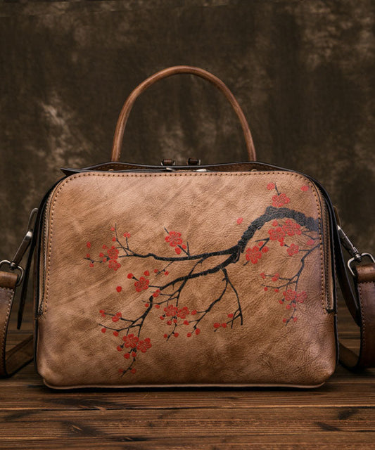 Umhängetasche aus Bio-Kalbsleder mit Blumenmuster in Gelbbraun