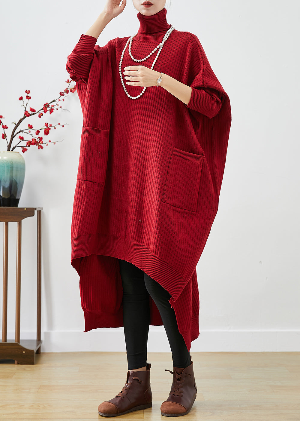 Blaues Oversize-Strickpulloverkleid mit Rollkragen und asymmetrischen Fledermausärmeln