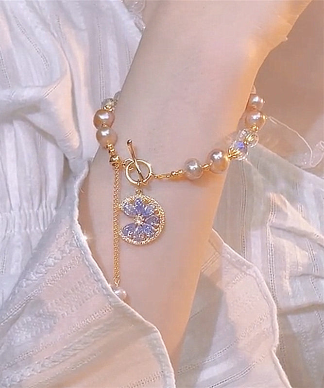 Normales lilafarbenes Charm-Armband aus Sterlingsilber mit Kristallperlen und Quaste