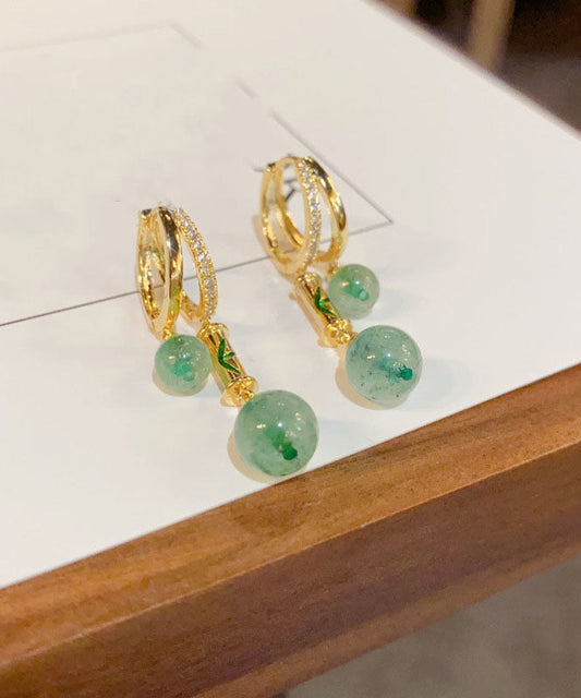 Retro-Ohrhänger aus vergoldetem Gold und Kupfer mit Zirkonia- und Bambusgelenk-Verbundsteinen