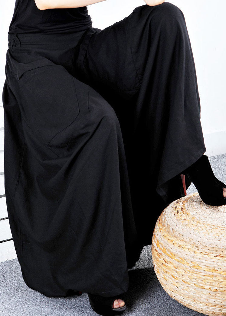 Schlichter schwarzer Winterrock mit asymmetrischem Patchwork-Design und Taschen