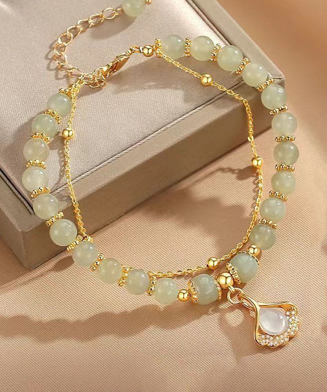 Schlichtes hellgrünes Sterlingsilber-Armband mit vergoldetem Zirkonia-Jade und Ginkgoblatt