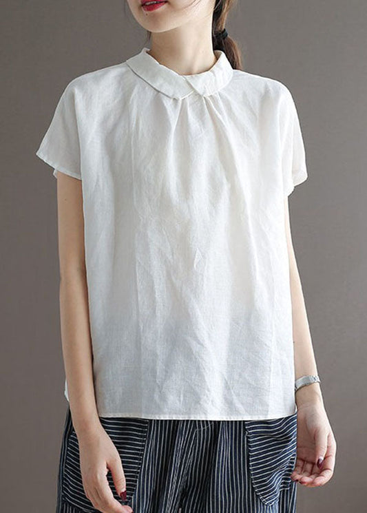 Blusa de lino con cuello Peter Pan y botones en azul marino para verano