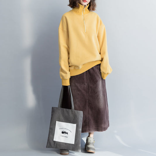 Einfaches Baumwoll-Tunika-Top, hochwertiges High-Neck-Nähtop in Gelb