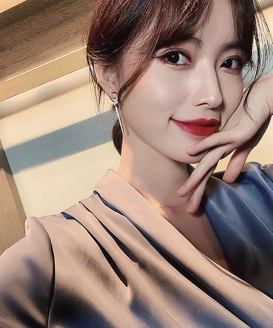 Schmale Tropfenohrringe aus Sterlingsilber mit eingelegter Zirkoniaquaste