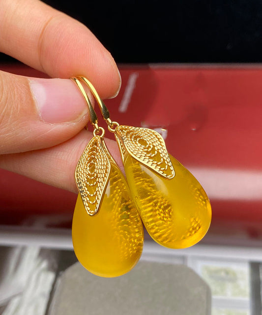 Pendientes colgantes de plata de ley amarilla con incrustaciones de cera de abeja y ámbar