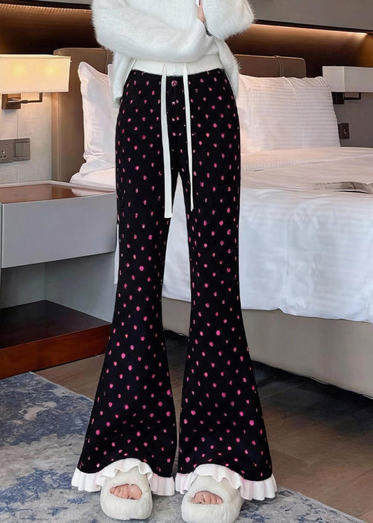 Stilvolle schwarze Strickhose mit Rüschenmuster und ausgestelltem Rock für den Winter