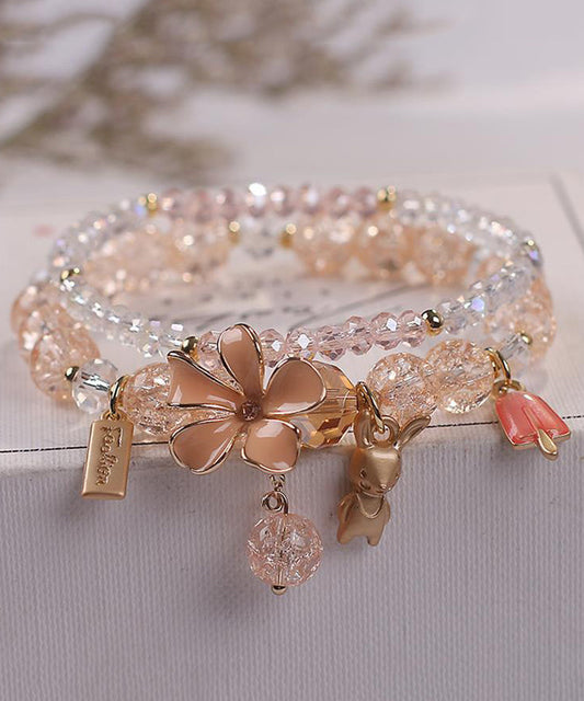 Elegante pulsera de aleación azul con cristales de circonita y dije floral