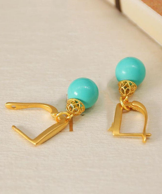 Elegantes pendientes colgantes de turquesa dorada en plata de ley verde claro
