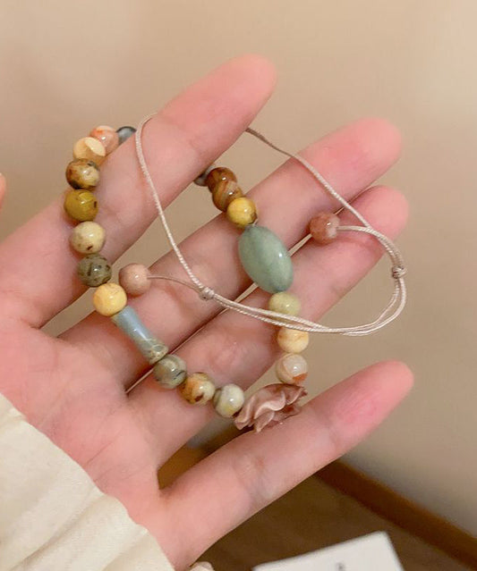 Einzigartiges, handgestricktes, zweiteiliges Armbandset mit Rosenperlen und Edelsteinen