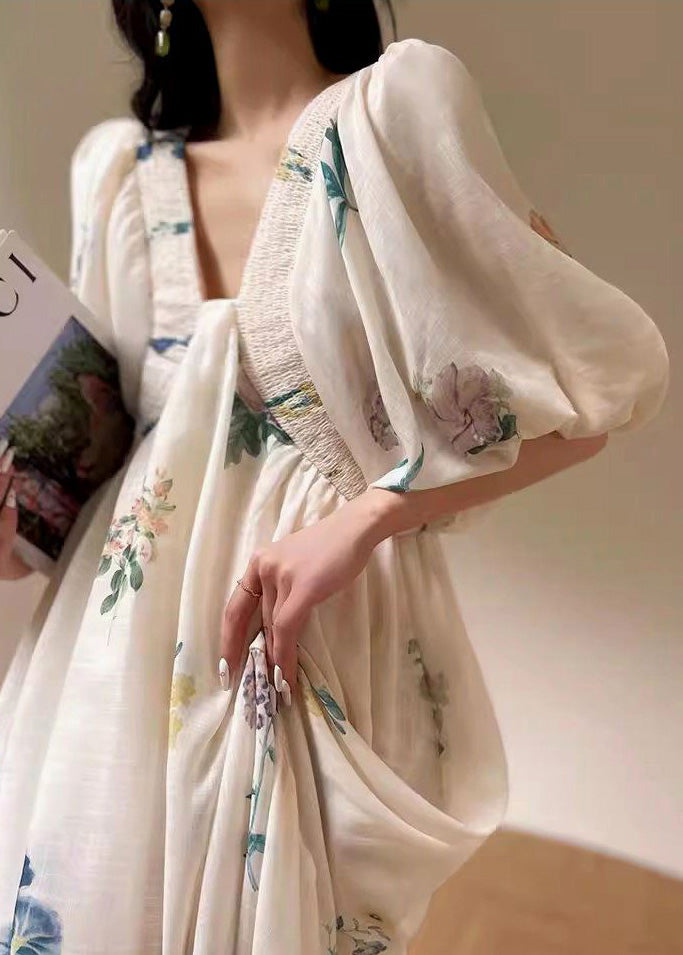 Weißes Baumwollkleid mit Puffärmeln und Print im Urlaubsstil