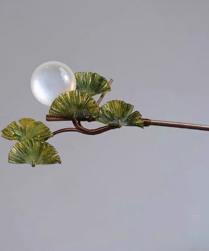 Abanico de madera marrón vintage con cuentas transparentes y horquilla