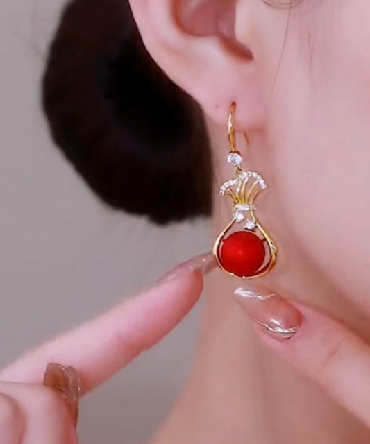 Pendientes colgantes vintage de plata de ley roja con circonitas doradas y perla