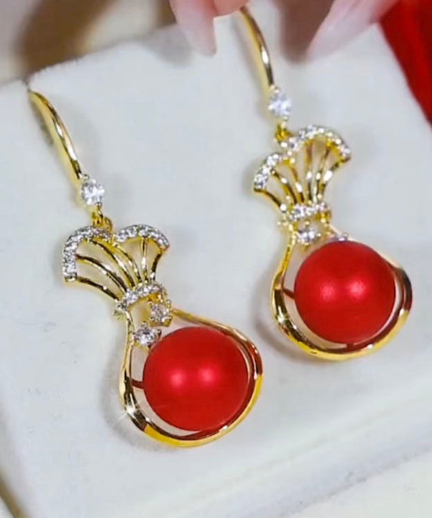 Pendientes colgantes vintage de plata de ley roja con circonitas doradas y perla