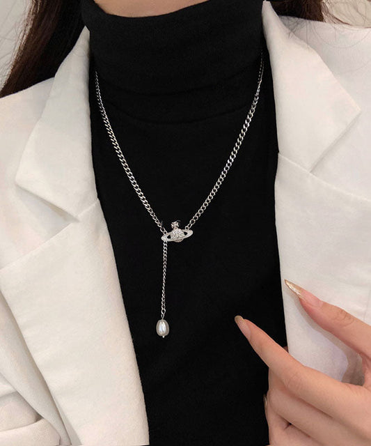 Collar con colgante de borla de perlas de acero inoxidable y seda vintage