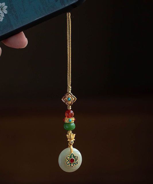 Vintage-Handyketten aus gelbversilbertem, vergoldetem Jade, Türkis, Lotus und vierblättrigem Kleeblatt