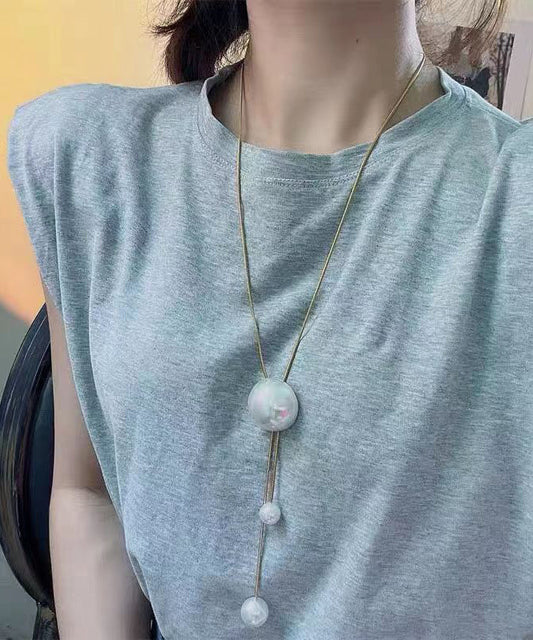 Collar con colgante de borla ajustable de perla dorada Vogue