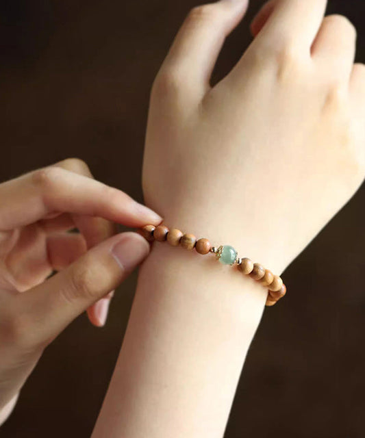 Pulsera de cuentas de caoba y jade amarillo para mujer