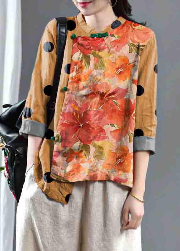 Lockeres, orangefarbenes, besticktes Leinenoberteil mit Blumenmuster und halblangen Ärmeln
