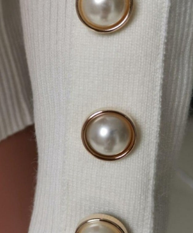 High-Neck Loose-Fit Sweater with Metal Button Collar
