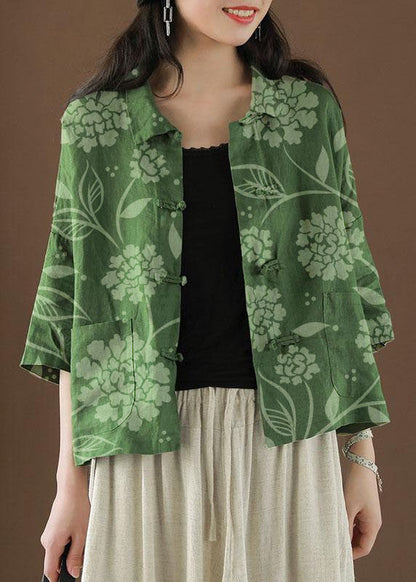 Preciosa blusa de lino de verano con bolsillos y cuello Peter Pan y estampado grande en verde