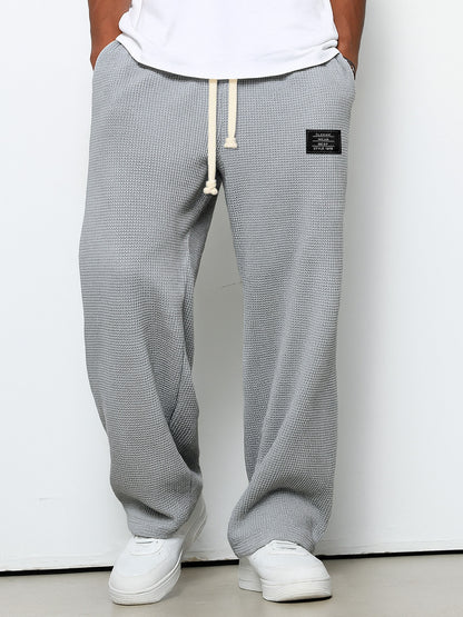 Men's Casual Waffle Embroidered Logo Simple Solid Color Trousers