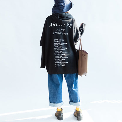 2024 Herbst schwarzer Wollmischmantel mit Aufdruck in Übergröße, Kapuze, mehrlagige Ärmel, mittellange Oberbekleidung