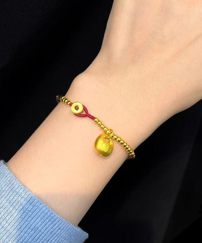Pulsera de cuentas tejidas a mano en oro 2024