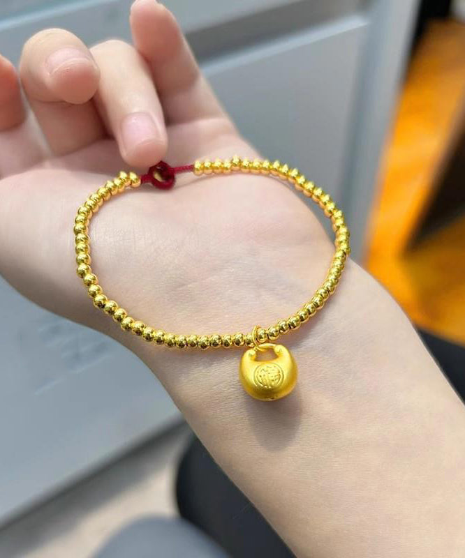 Pulsera de cuentas tejidas a mano en oro 2024