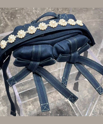 Bolso de hombro versátil con lazo y perlas en azul denim (2025)