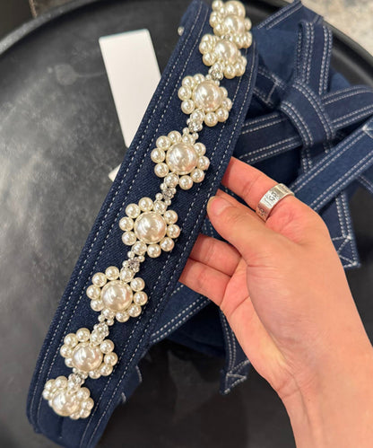 Bolso de hombro versátil con lazo y perlas en azul denim (2025)