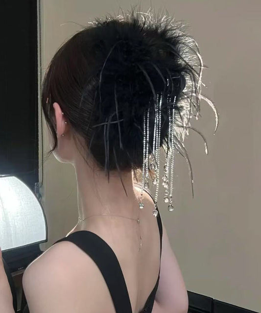 Horquilla con borlas y plumas de aleación morada 2025