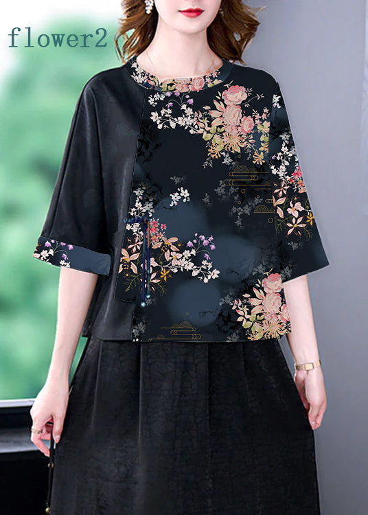 Schwarzes Patchwork-Oberteil mit O-Ausschnitt und Kranich-Print