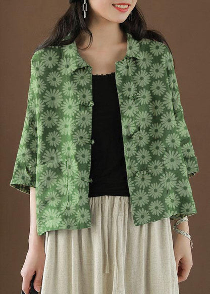 Preciosa blusa de lino de verano con bolsillos y cuello Peter Pan y estampado grande en verde