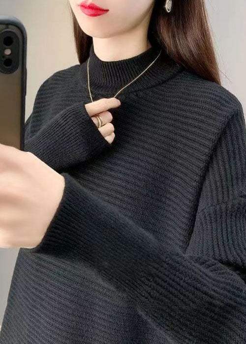 Art Chocolate – Lockeres Strickkleid mit asymmetrischem Troddeldesign