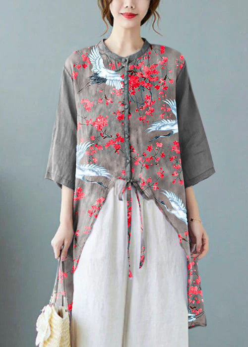 Blusa de lino con bolsillos y botones morados de media manga