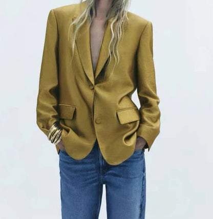 Single-breasted fashion blazer with a bright metallic sheen