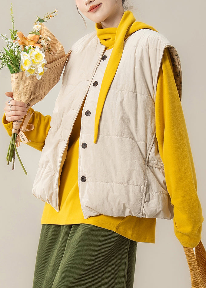 Aprikosenfarbene, geknöpfte, baumwollgefüllte Weste und gelbes T-Shirt, zweiteiliges Set mit Rundhalsausschnitt