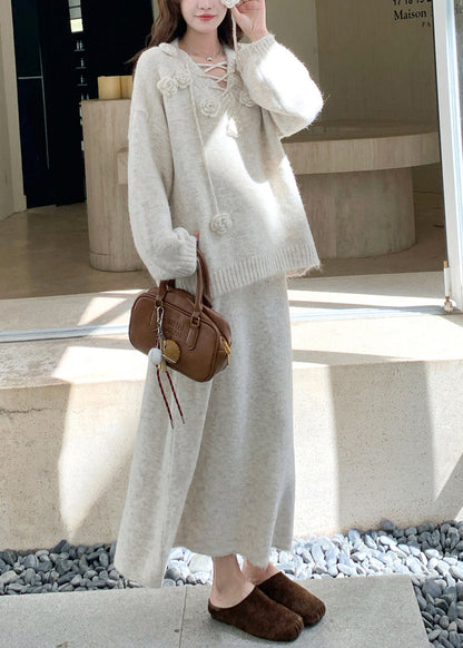 Conjunto de dos piezas de invierno de punto acogedor con cordones color albaricoque y cuello en V