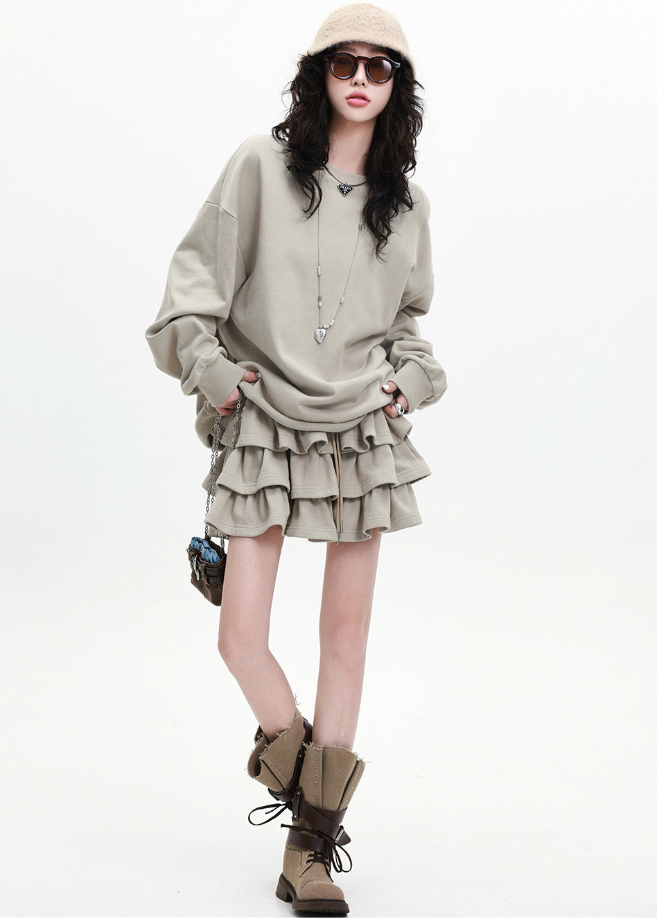 Aprikosenfarbenes, lockeres Baumwoll-Zweiteiler-Set mit Lagenrock und Rüschen für den Frühling