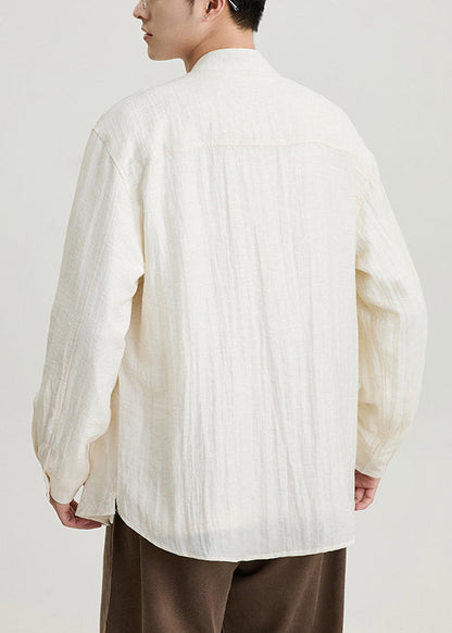 Aprikosenfarbene Herrenhemden aus einfarbiger Baumwolle mit Stehkragen und Taschen